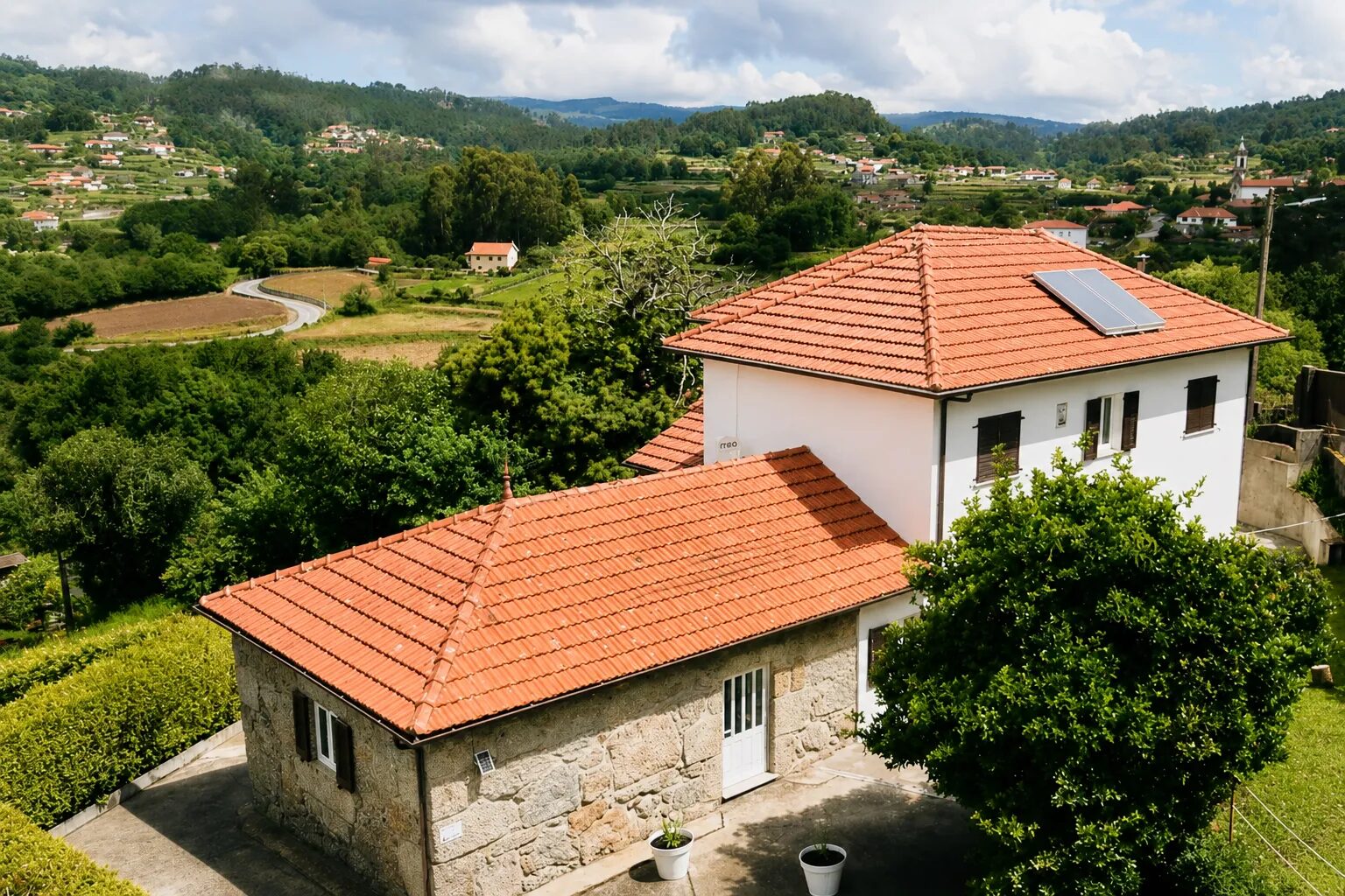 Vines and green hillsides in the Coura valley, in the heart of the Vinho Verde region